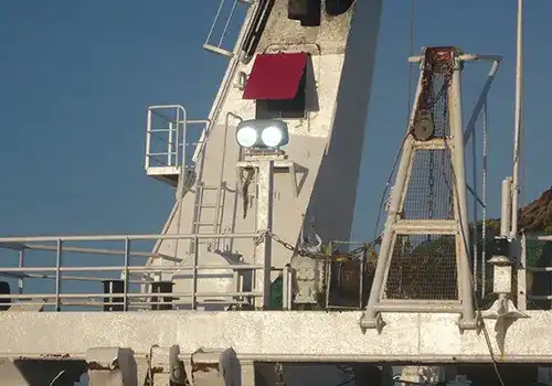 What are the main benefits of LED flood lights on ships?